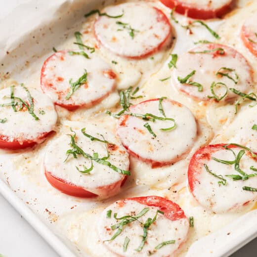 Landscape photo of baked tomatoes.