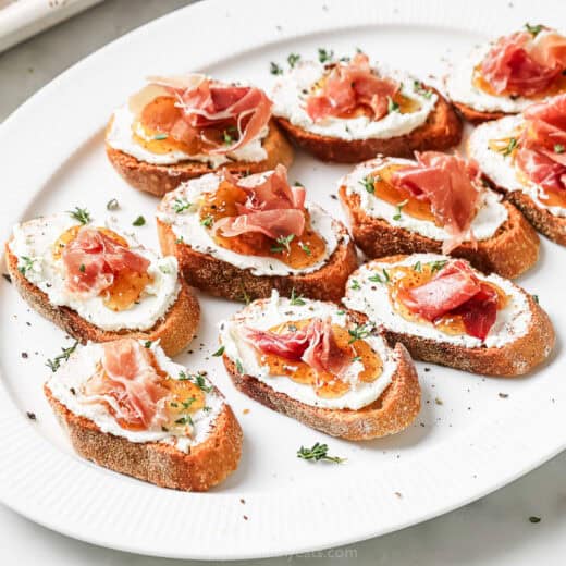 Landscape photo of goat cheese crostini.