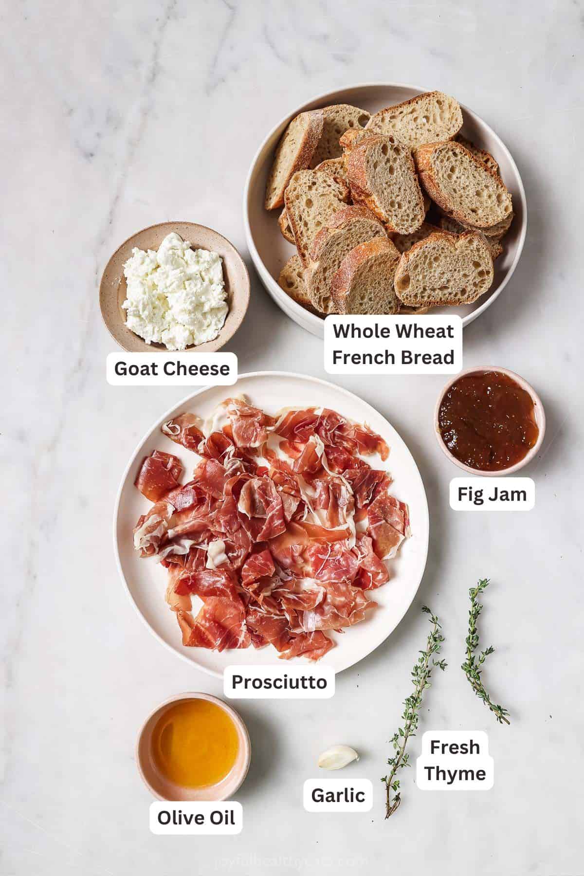 Labeled ingredients for making goat cheese crostini.