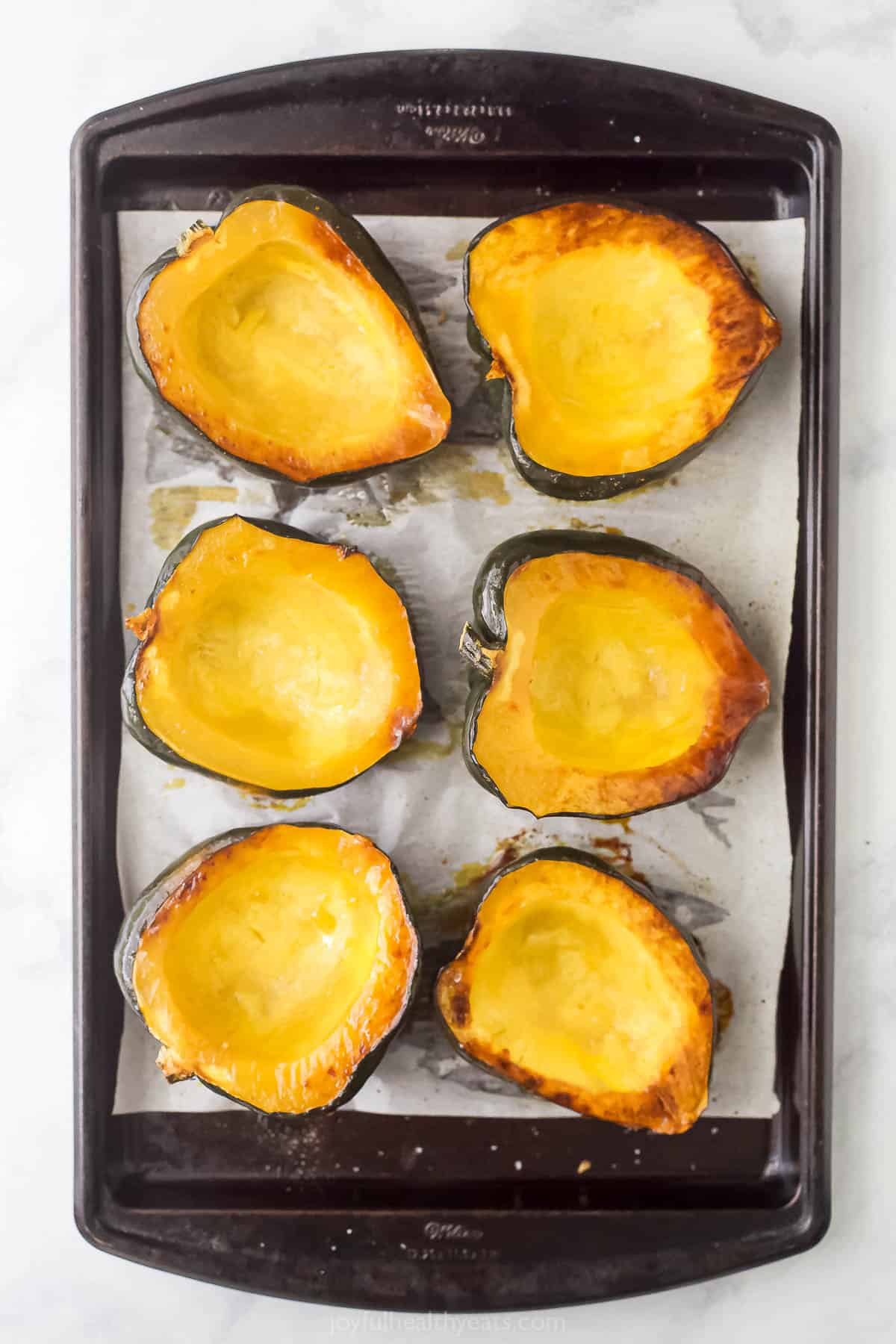 Roasted, fork-tender squashes fresh out of the oven.