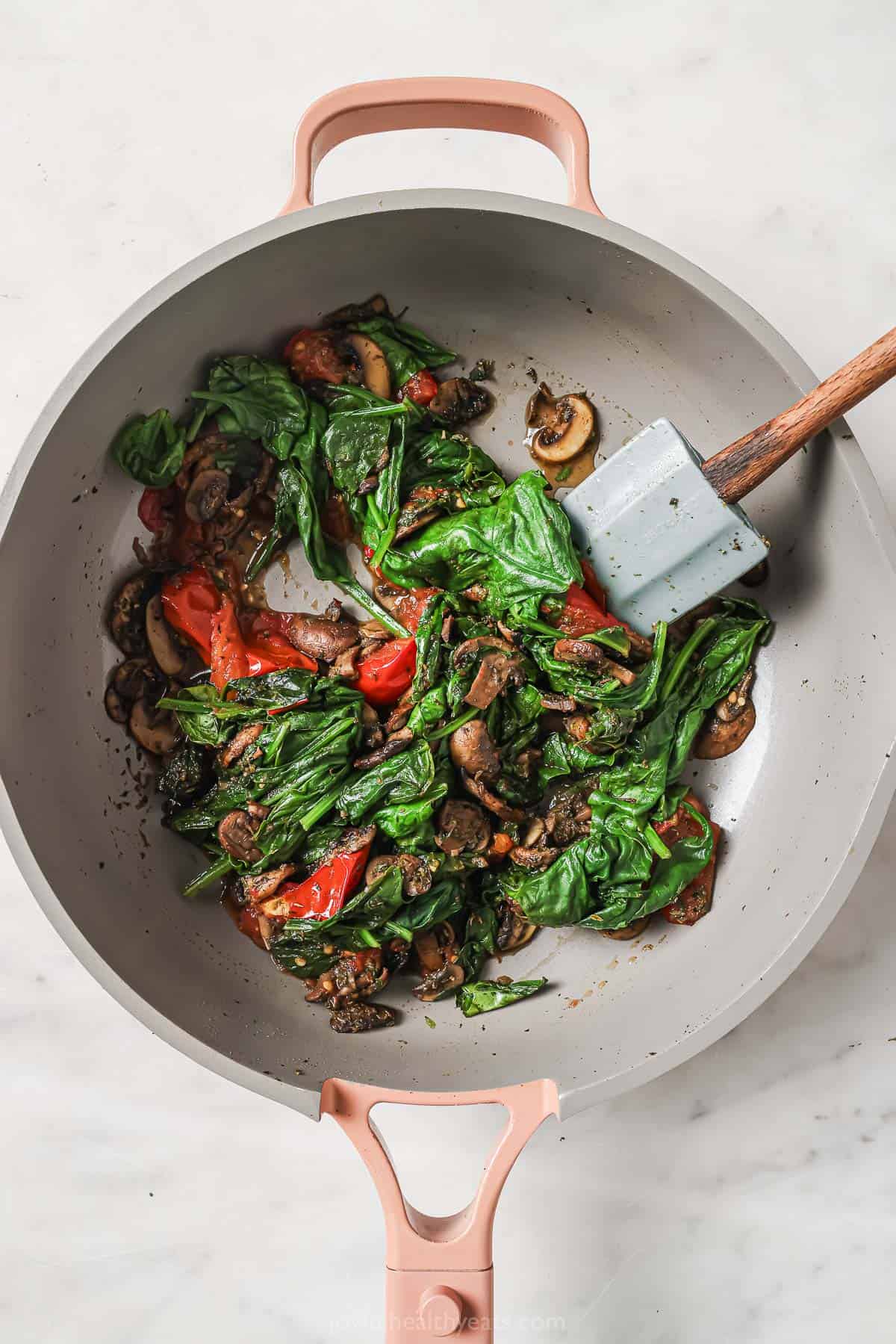 Sautéed mushrooms with tomatoes and spinach. 