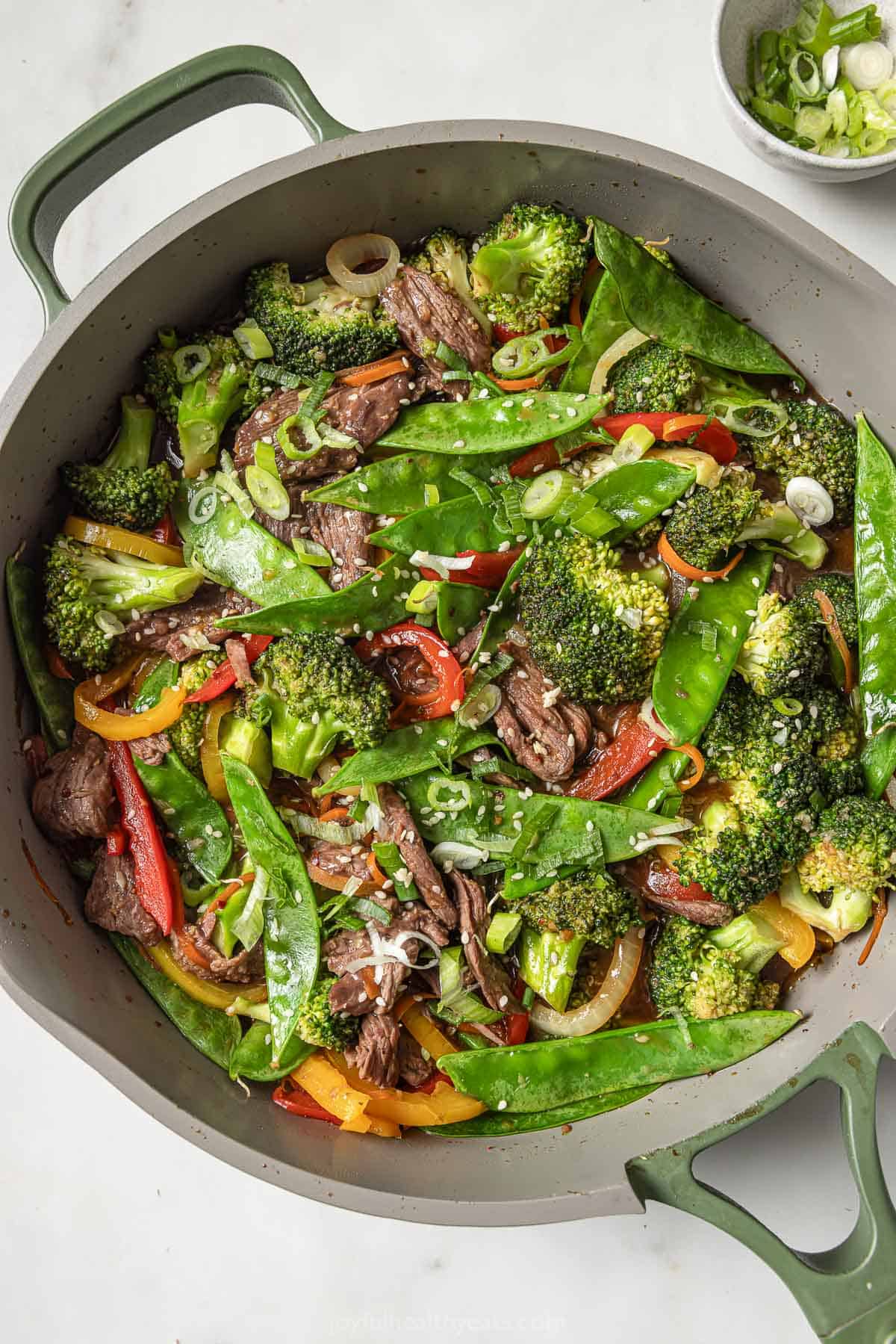 Skillet with homemade sweet-and-spicy beef and veggie stir fry. 