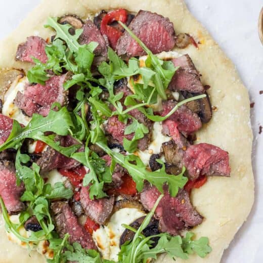 Overhead view of homemade steak pizza