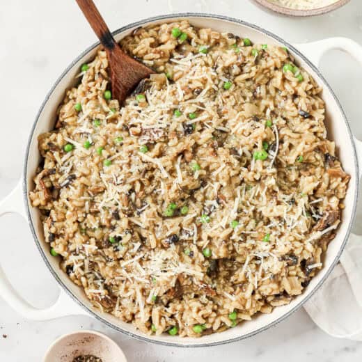 Landscape photo of wild mushroom risotto with parmesan.