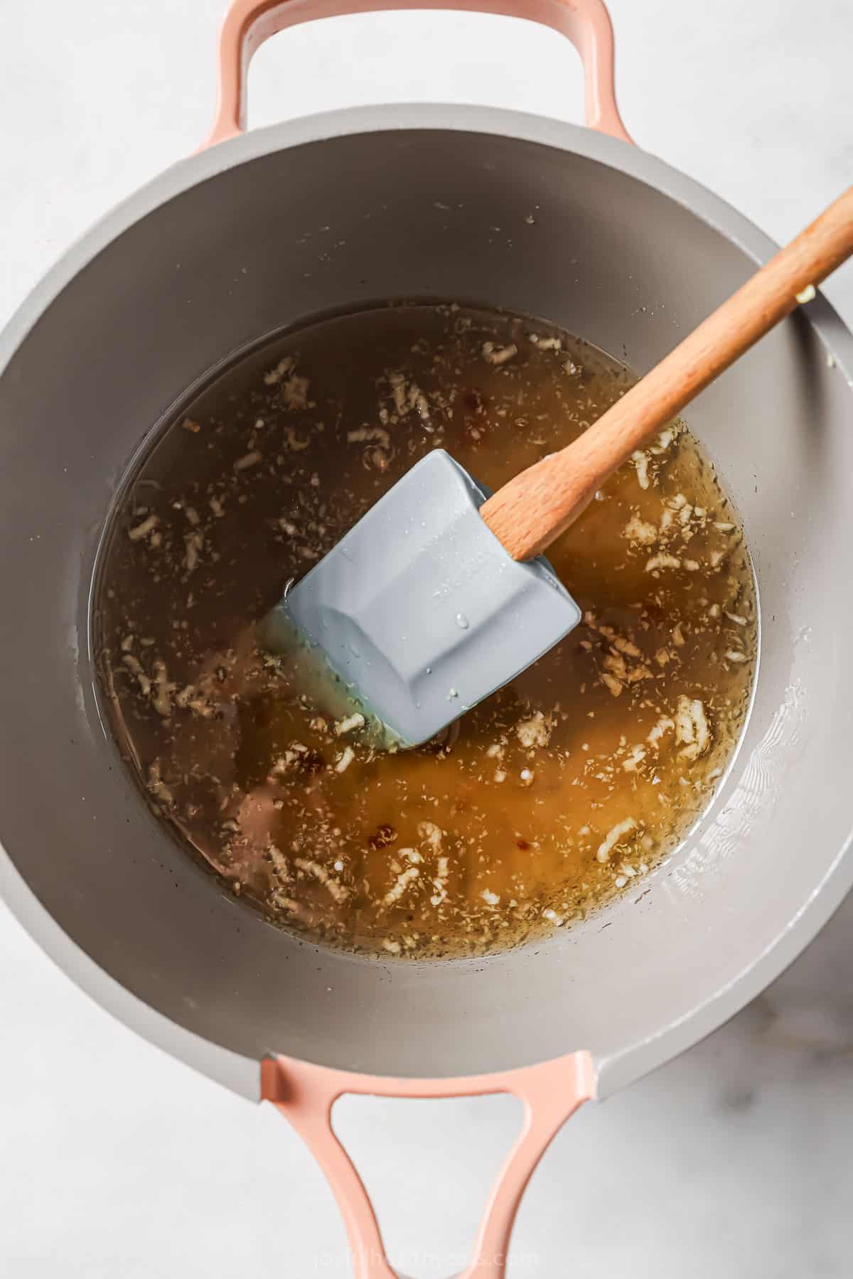 Simmering the Thai chili sauce in a pot. 