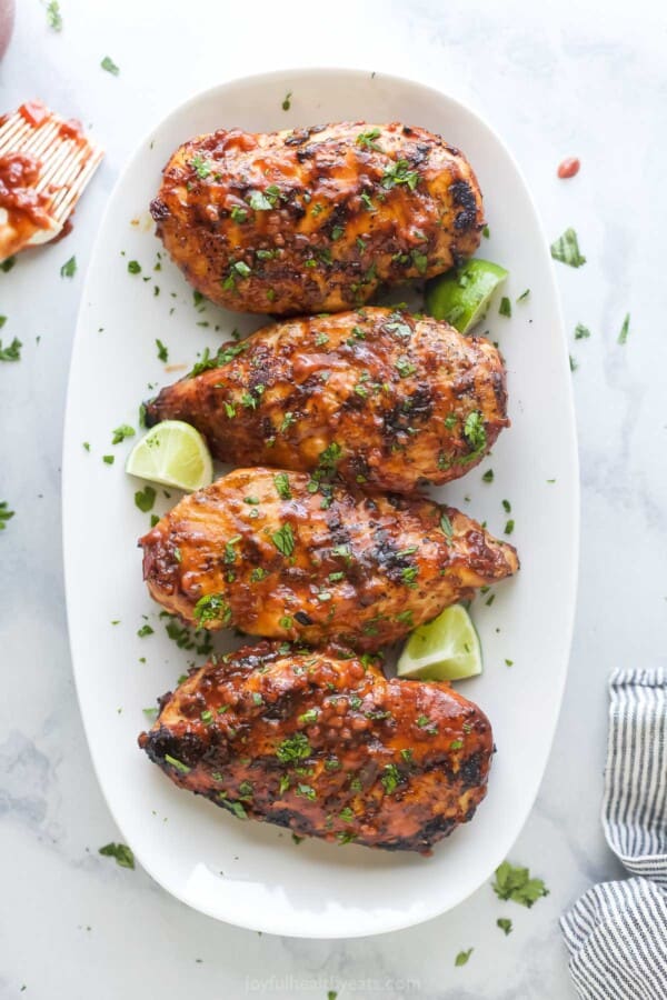 4 pieces of grilled chicken with homemade raspberry-chipotle BBQ sauce.