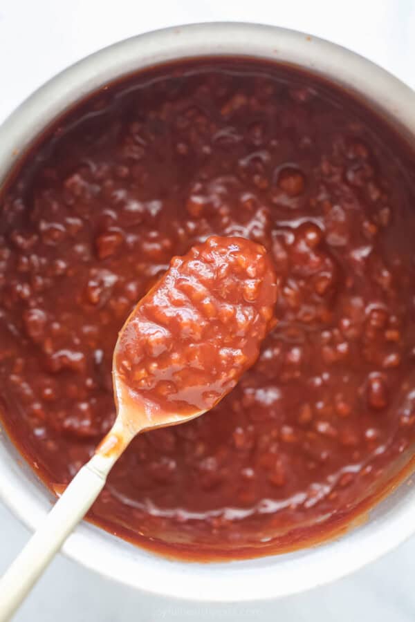 Spoonful of raspberry chipotle BBQ sauce.