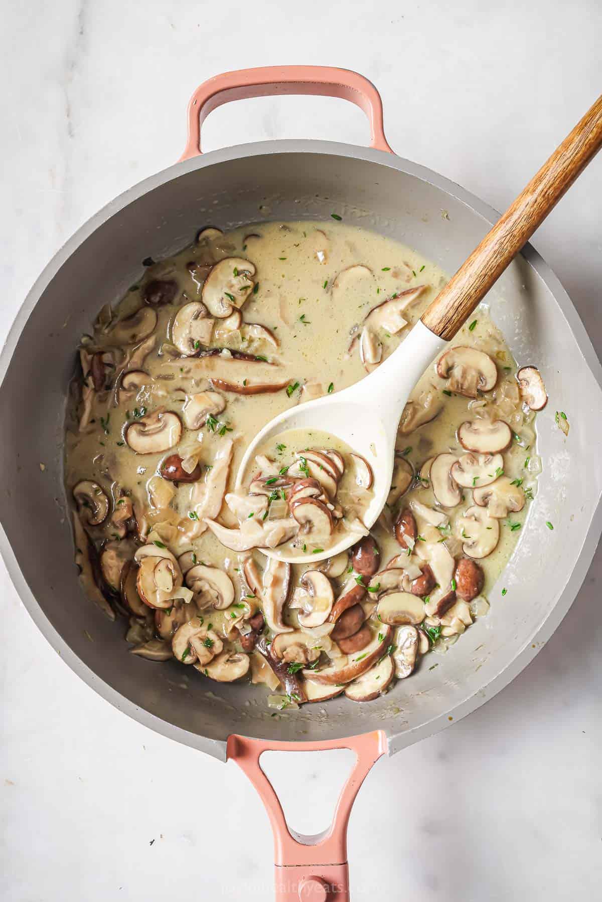 Creamy coconut milk-mushroom sauce with lemon juice and fresh thyme. 