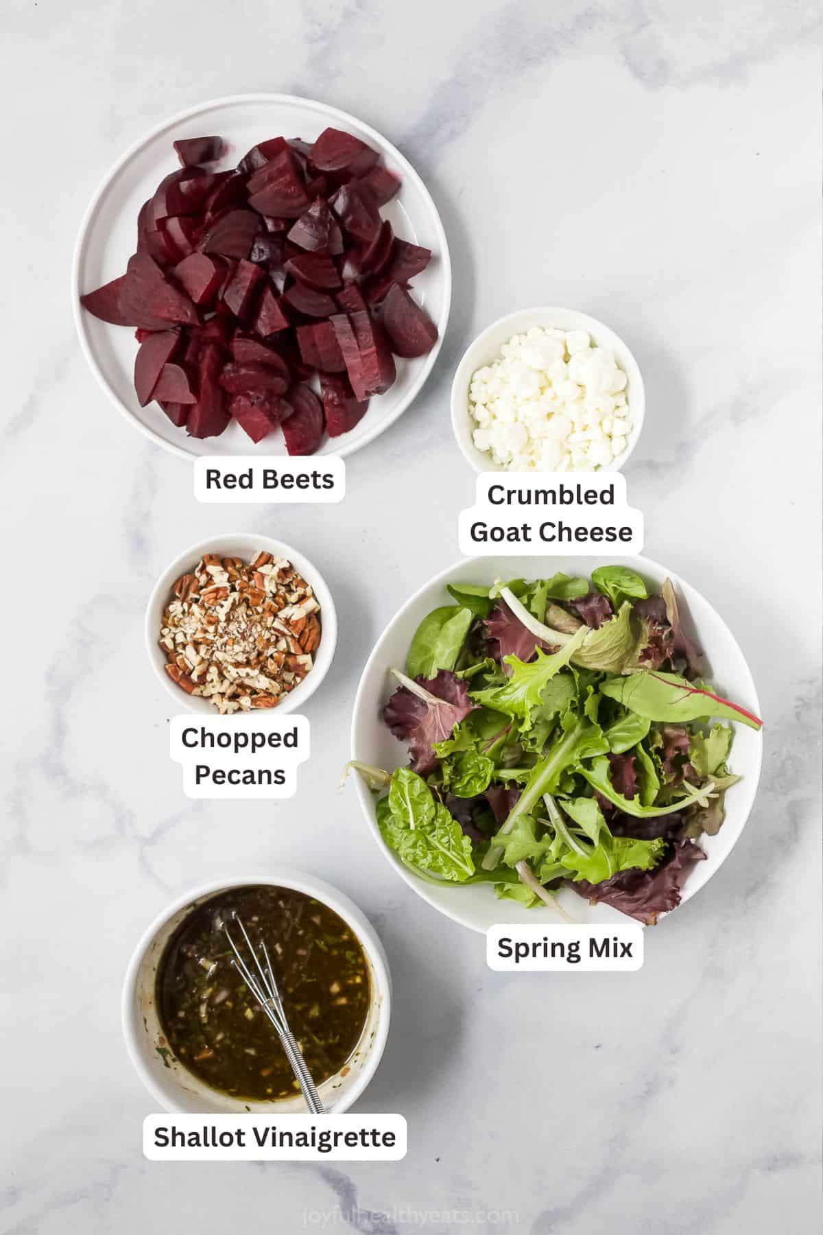 Overhead view of ingredients for roasted beet salad with goat cheese with labels