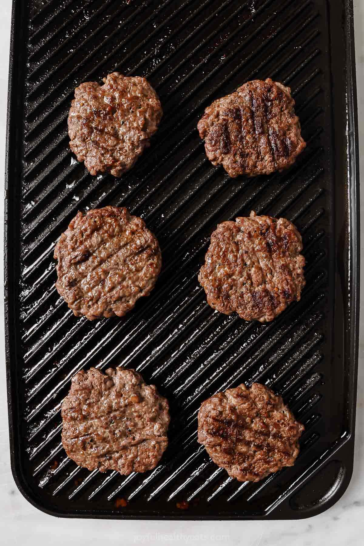 Grilling the patties. 