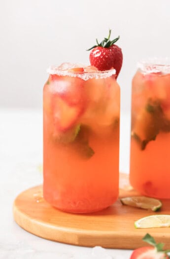 An agave-sweetened strawberry mojito recipe with a salt rim.