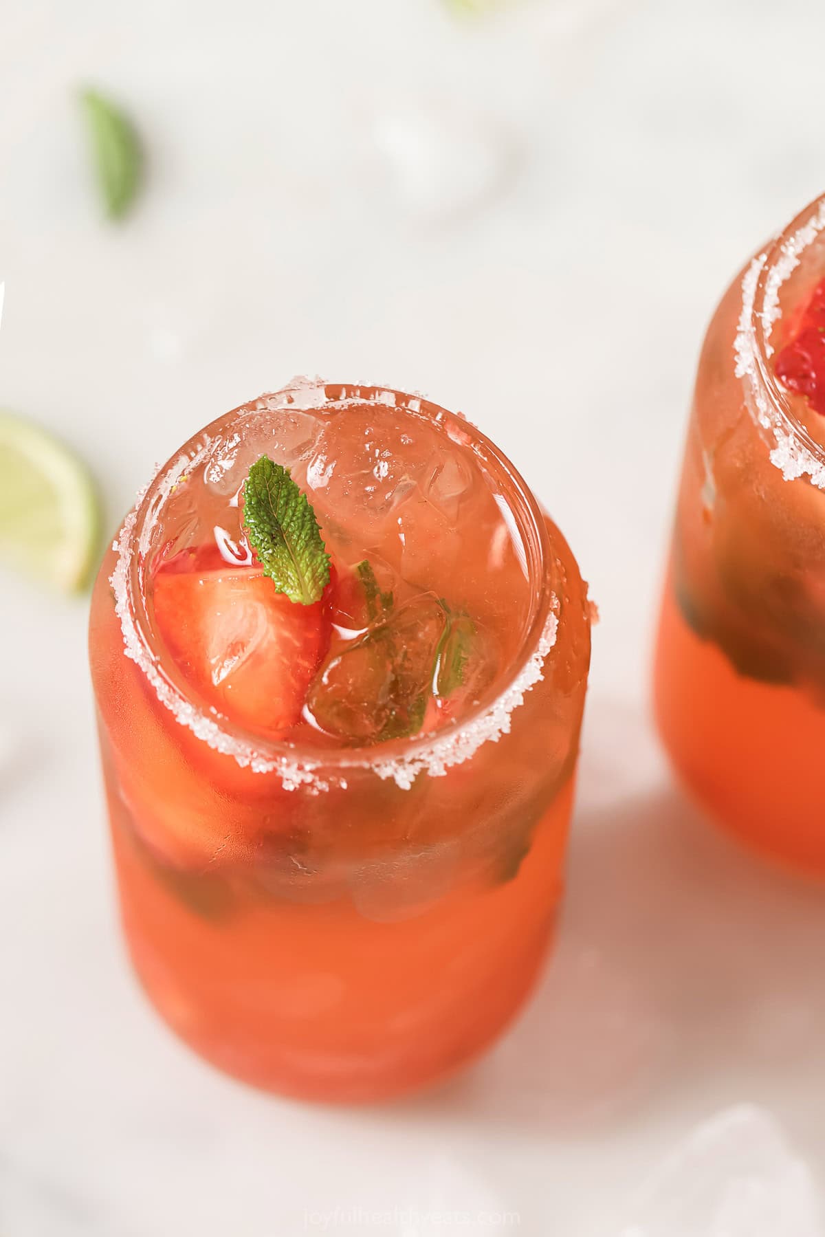 Overhead photo of a refreshing strawberry mojito. 