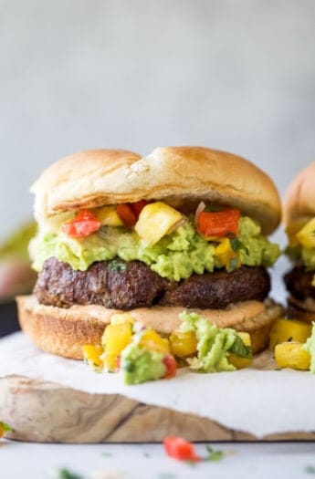 An avocado burger with avocado mash and pineapple relish.