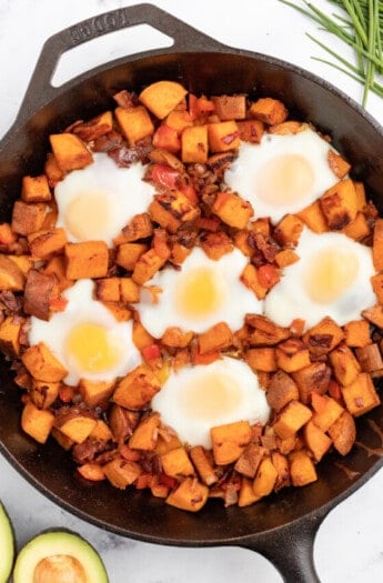 Cooked eggs in the skillet.