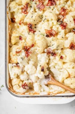 Freshly baked cheesy cauliflower au gratin with bacon.