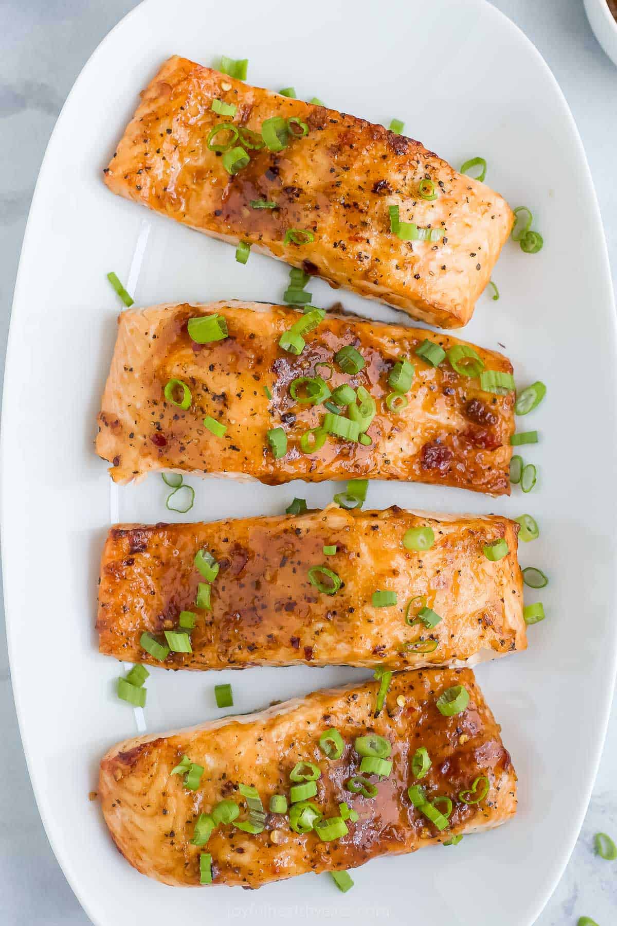 Overhead view of sweet chili salmon on platter