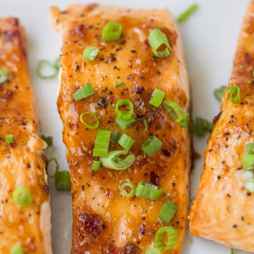 Overhead view of sweet chili salmon with green onions