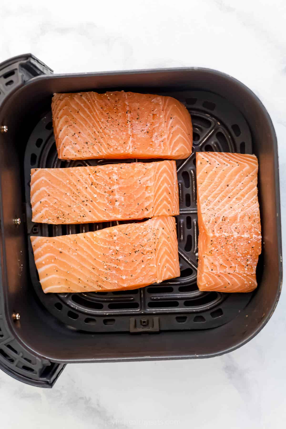 Salmon in air fryer basket