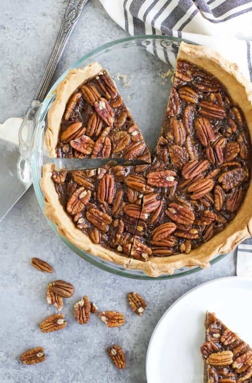 Sliced pecan pie recipe in the baking dish.