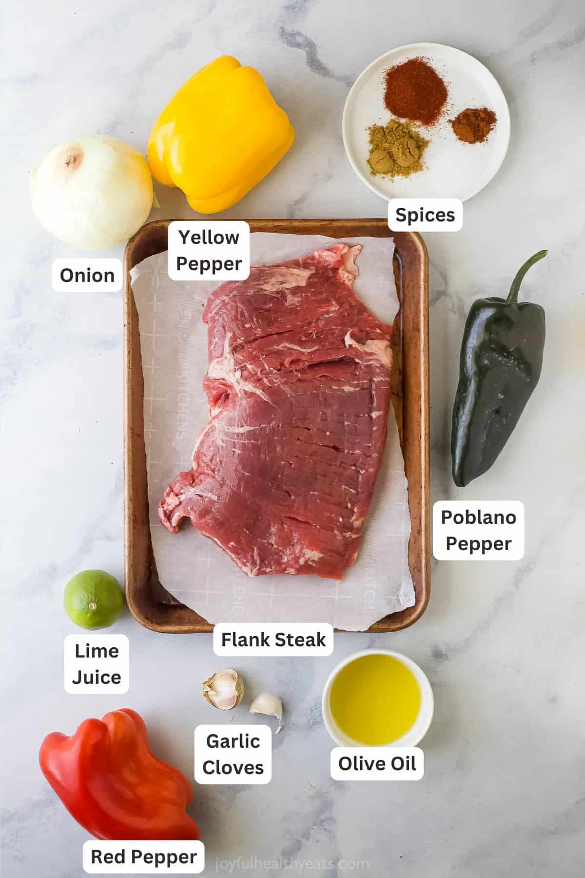 Ingredients for making sheet pan steak fajitas. 