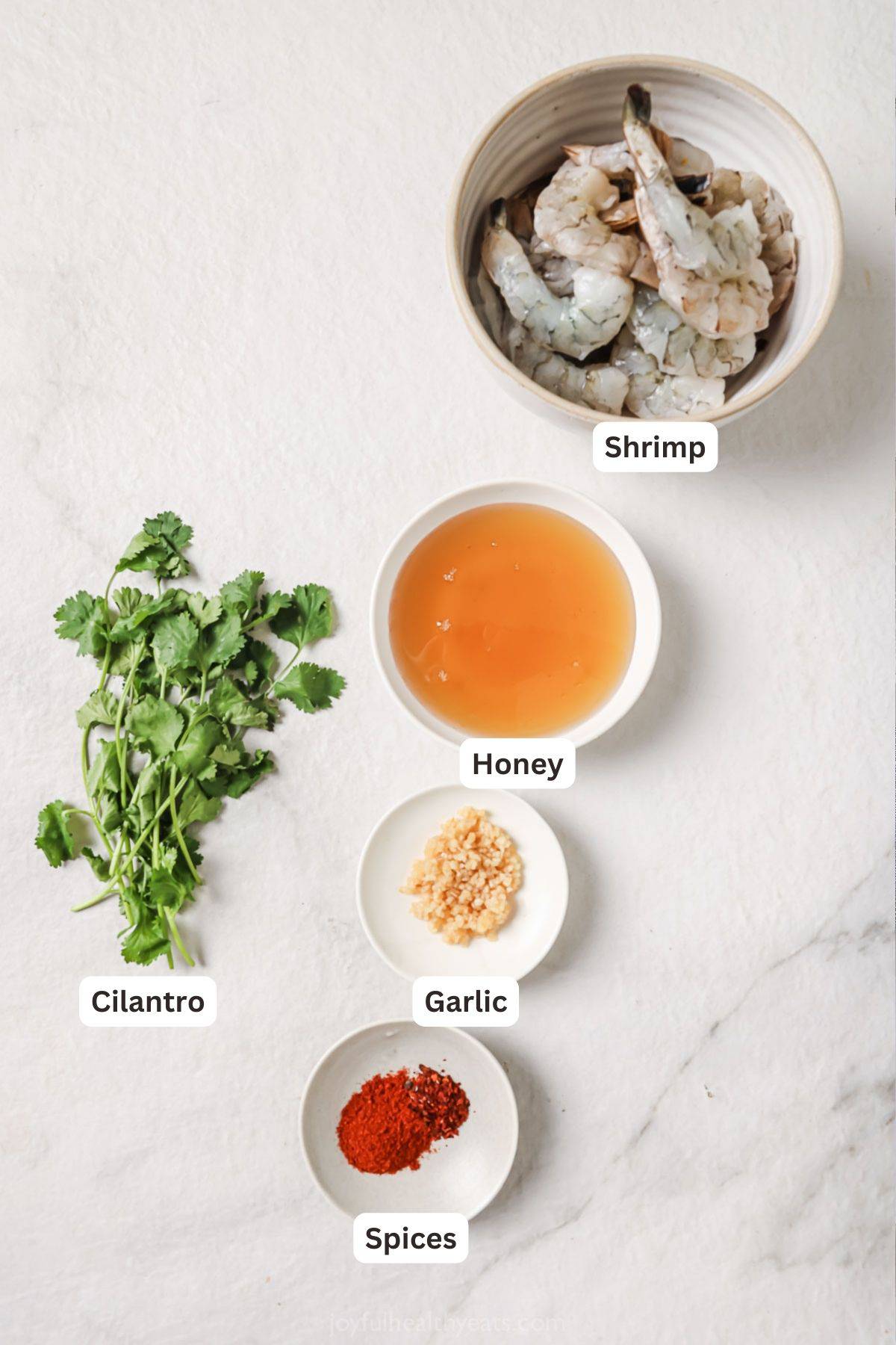 Labeled ingredients for honey garlic shrimp. 