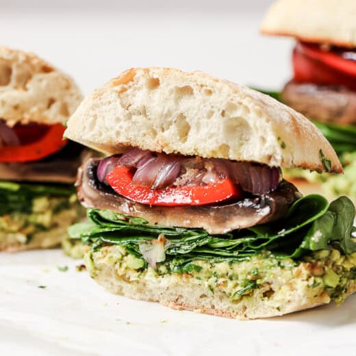 Landscape photo of sliced mushroom portobello burger.