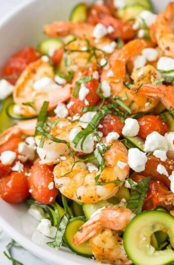 Close-up of zoodle pasta with veggies.