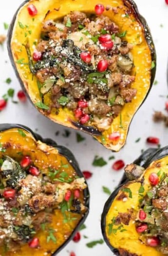 close up photo of apple sausage stuffed acorn squash