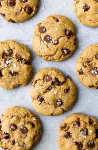 overhead photo of freshly baked vegan pumpkin chocolate chip cookies