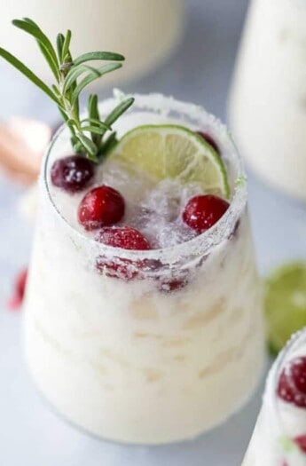 pinterest image for an easy white christmas margarita pitcher recipe