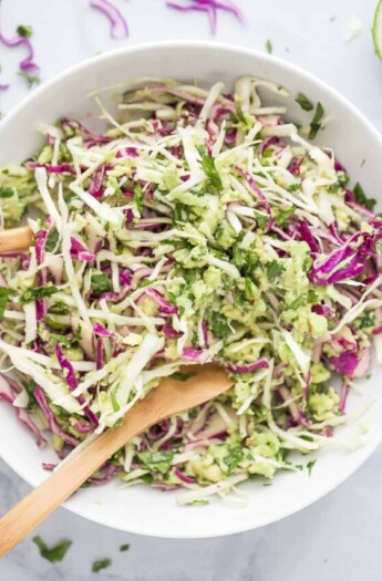 shredded creamy coleslaw for fish tacos in a bowl