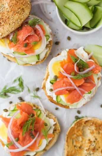 Toasted, open bagels and lox.