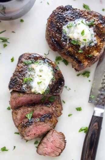 Sliced grilled filet mignon with a pink center.