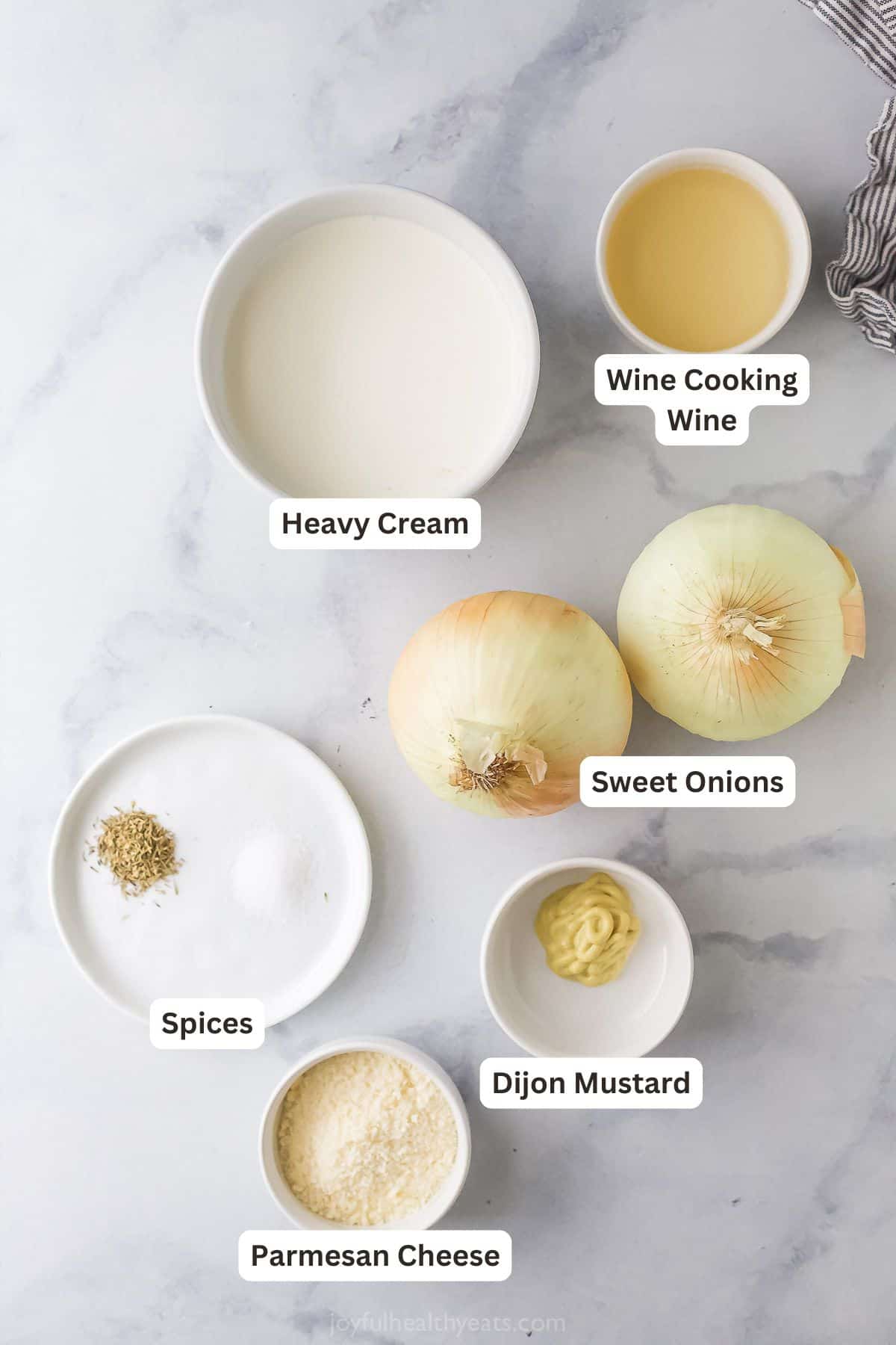 Labeled ingredients for making the creamed onions recipe. 