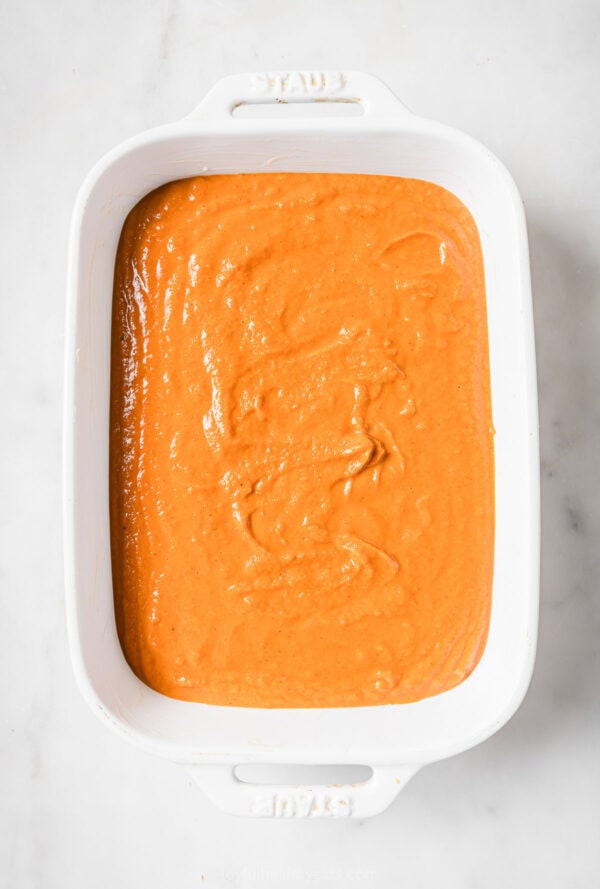 The wet pumpkin mixture in the baking dish.