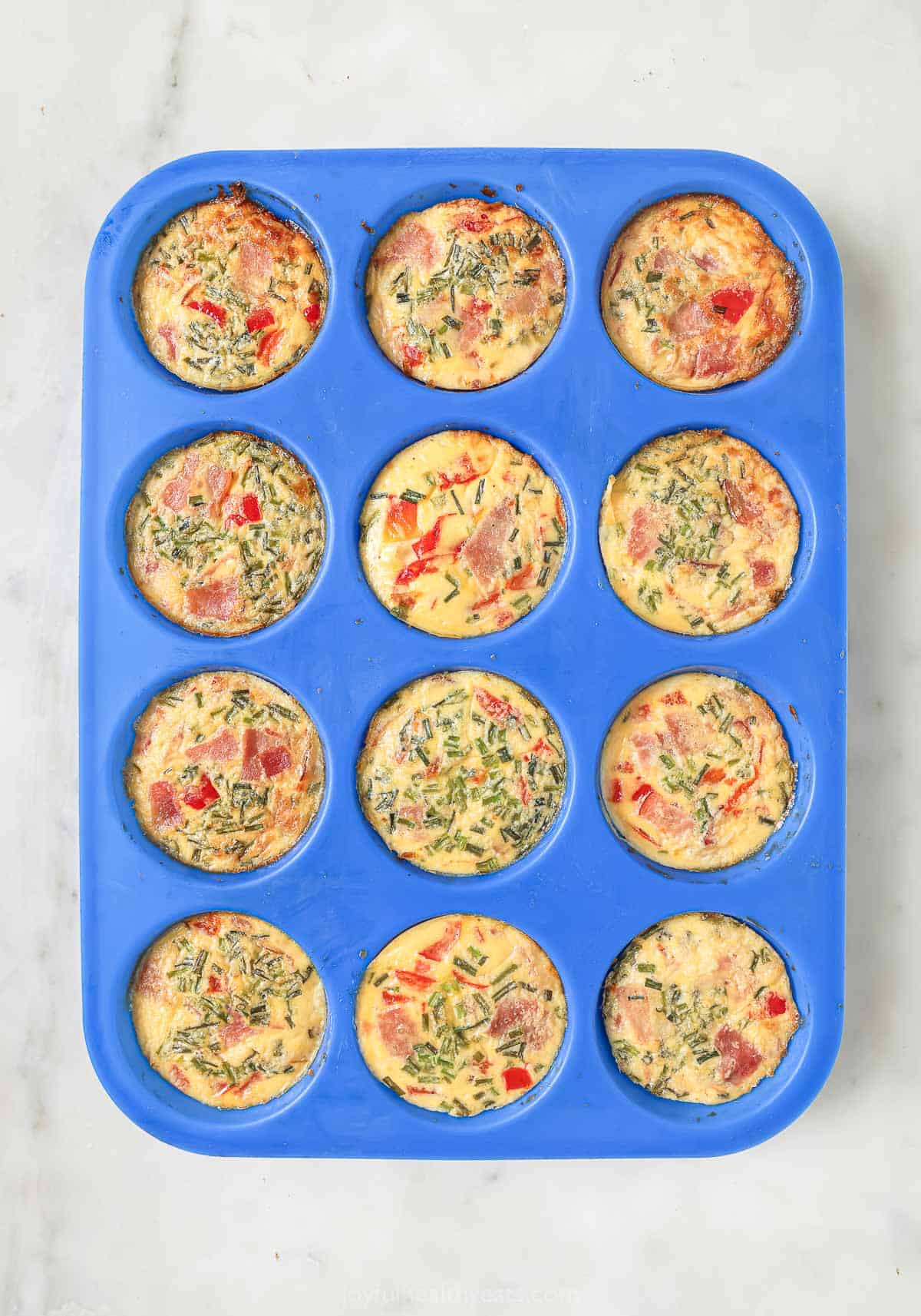 Baked egg bites in the muffin tray. 