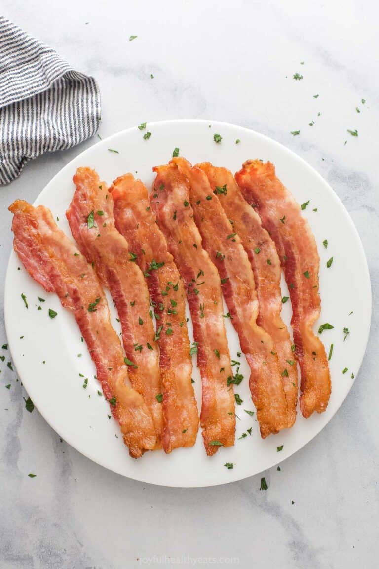 Baked bacon on a serving plate.