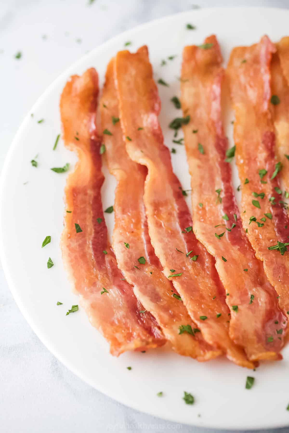 Close-up of crispy bacon on a plate. 